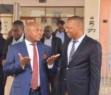 Japheth Kasimbu, a consumer expert at IGAD, conferring with Machakos Deputy Governor Francis Mwangangi during a workshop on pastoral laws to improve the lives of pastoralists at the Samara Hotel, Machakos