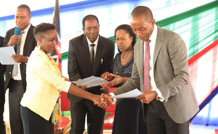 Kiambu County governor Kimani Wamatangi issuing promotion letters to Healthcare workers