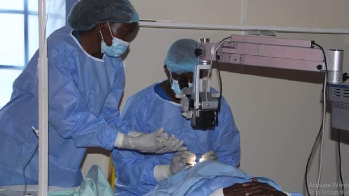 Medics in Meru operating a patient