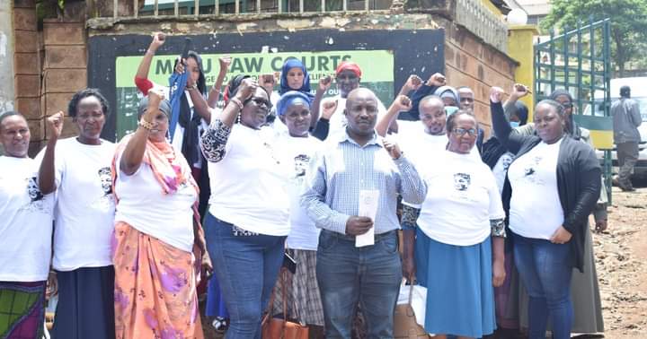 National Coalition of Human Rights Defenders led by Kamau Ngugi outside the Meru Court yesterday