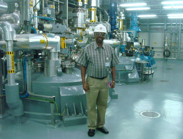 Prof. George Njoroge, a renowned medical researcher and the founder of COAL project in Naivasha at a drug manufacturing site in Singapore.