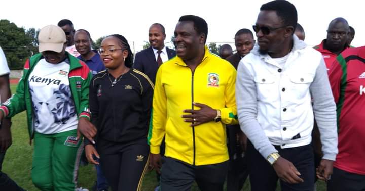 Sports CS Ababu Namwamba with Tharaka Nithi county governor Muthomi Njuki and others sporting officials during the opening of KYISA games yesterday