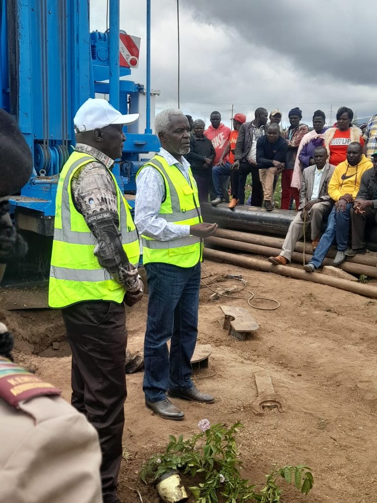 Buuri MP Mugambi Rindikiiri (right) with Tana Water Works Development Agency Chairman Wanyaga Gathaka during the launching of the borehole last weekend.