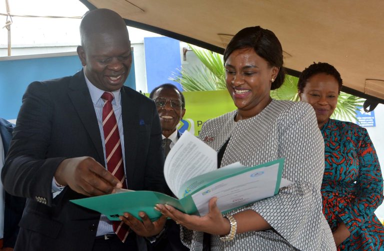 Tetrapak Managing Director, East Africa Jonathan Kinisu (left)
