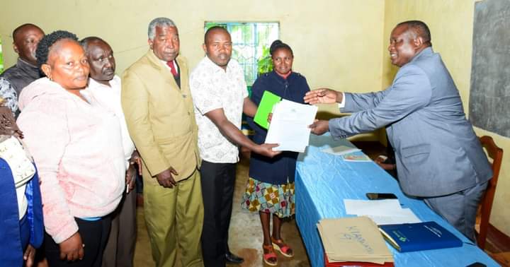 Kirinyaga County Executive Committee Member (CECM) for Education and Public Service James Kinyua handing over appointment letters