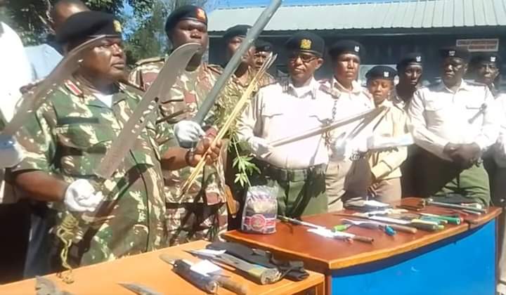 Nakuru County based government officials displaying assorted weapons