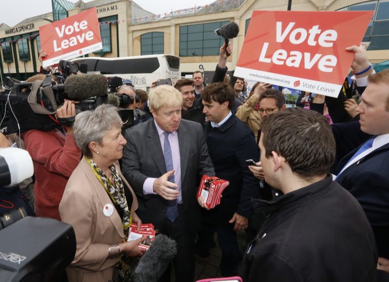 Photo 1 Big propagabda push... Boris Johnson nwas in the forefront of pushing for the UK to quit the European Union. Here he distributes Leave leafelets to a crowd lf supporters.
