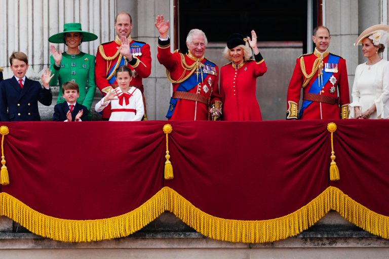 Photo 1 The King and Queen with family members on the Buckingham Palace balcony to watch the air display on his first official birthday.