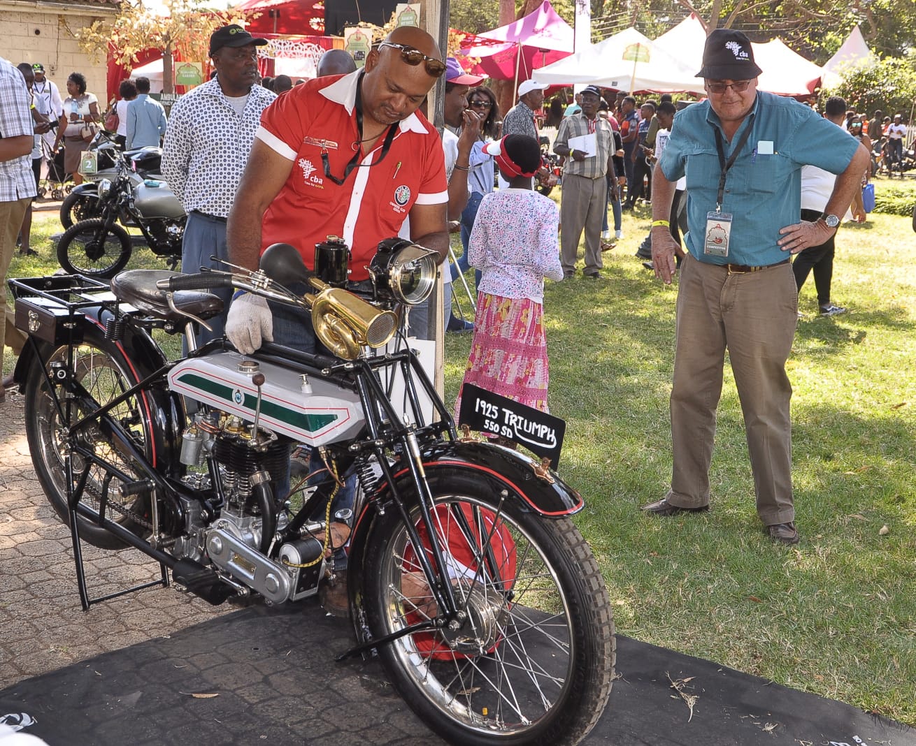 The 1925 Triumph of Dominique Antoine (right) is the oldest bike in this year's Africa Concours d'Elegance