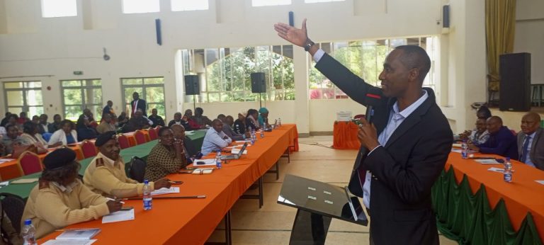 Tetu MP Geoffrey Wandeto addressing education Stakeholders at Kagumo Teachers Training College in his constituency yesterday where his Dagoretti South counterpart John Kiarie was the chief guest
