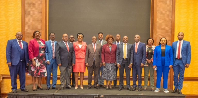 CS Alice Wahome and ministry of Lands offical pose for a photo with Kiambu County Members of National Assembly