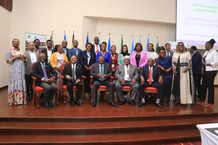 Delegates pose for a photo
