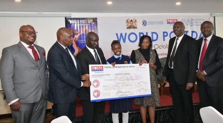 Hezron Nyamberi, Senior Deputy Secretary at BT, represented PS Prof. Edward Kisiang'ani at the 2023 Universal Postal Union celebration breakfast, where Clare Gakii won the Essay Writing Contest.