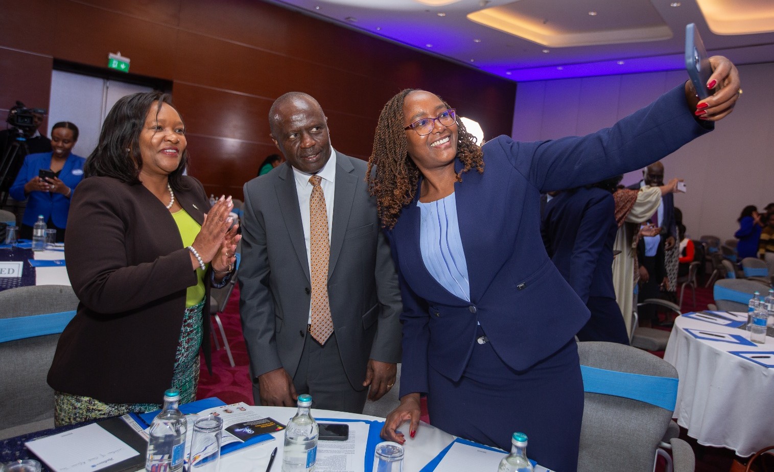 Kenya Bureau of Standards Managing Director Esther Ngari takes a selfie with Cabinet Secretary, Ministry of Investments, Trade and Industry Rebecca Miano