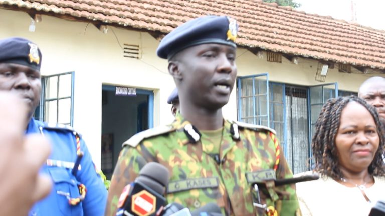 Kisii county commander Charles Kases addressing media during the recovery of electronic gadgets in Kisii town.