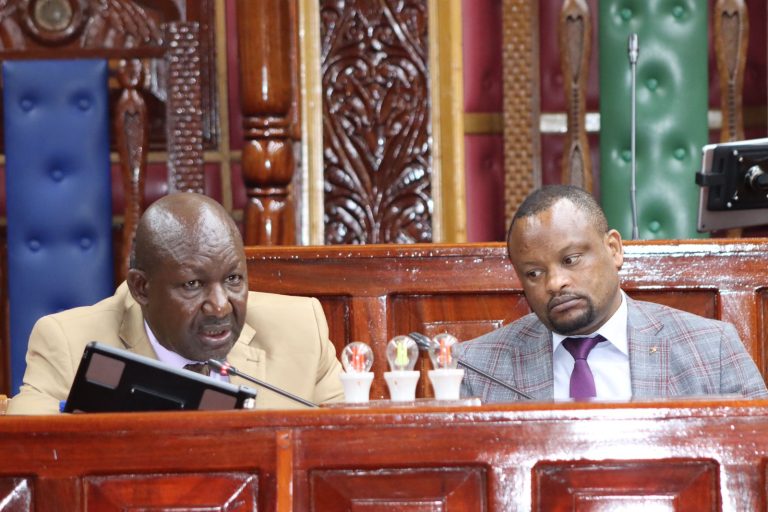 Left Hon Justice Kimei Mp Sigowet, Right Vice-chair Hon Yengon Mp Konoin.