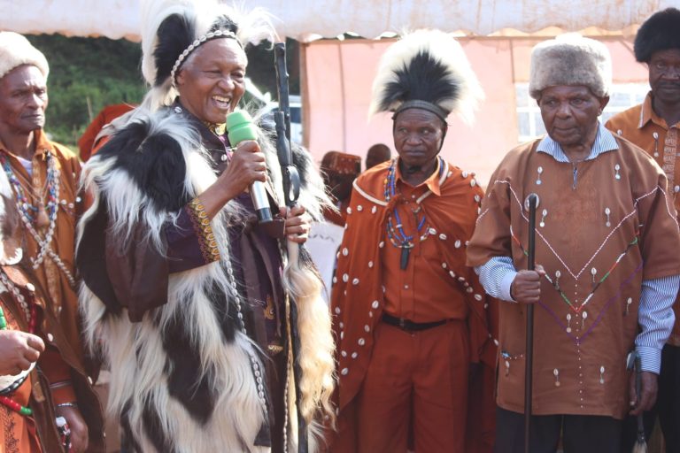 Members of Kikuyu Council of Elders honours outgoing County Chairman Father Joachim Kitonga (right) who has served the council for 18 years