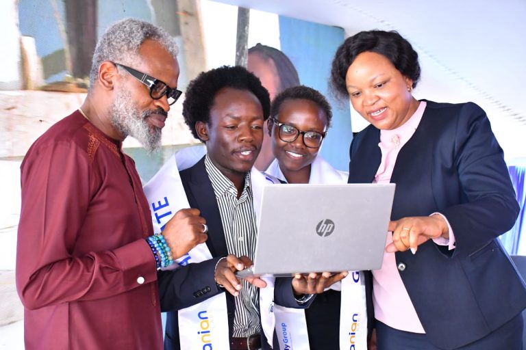 Adanian Labs CEO John Kamara and Family Bank CEO Designate Nancy Njau with graduates Barasa Brian and Cheryl Owala