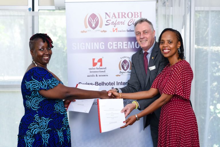 Mukawa (Hotels) Holdings Ltd Directors Ms Clare Njeri Githunguri (left) and Ms Lilian Joy Nyagaki Githunguri (right) exchange the hotel management agreements