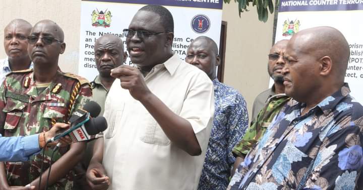 North Eastern Regional Commissioner John Otieno addressing the Media in Garissa town yesterday. On the right is National Counter Terrorism Centre, head of Prevention and Resilience Njenga Miiri