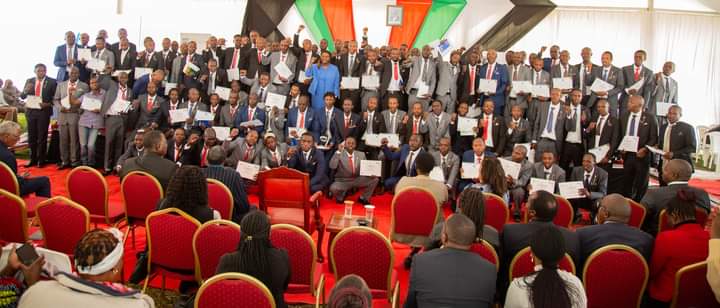 Pastor Dorcas Rigathi pose for a photo with yesterday's graduates