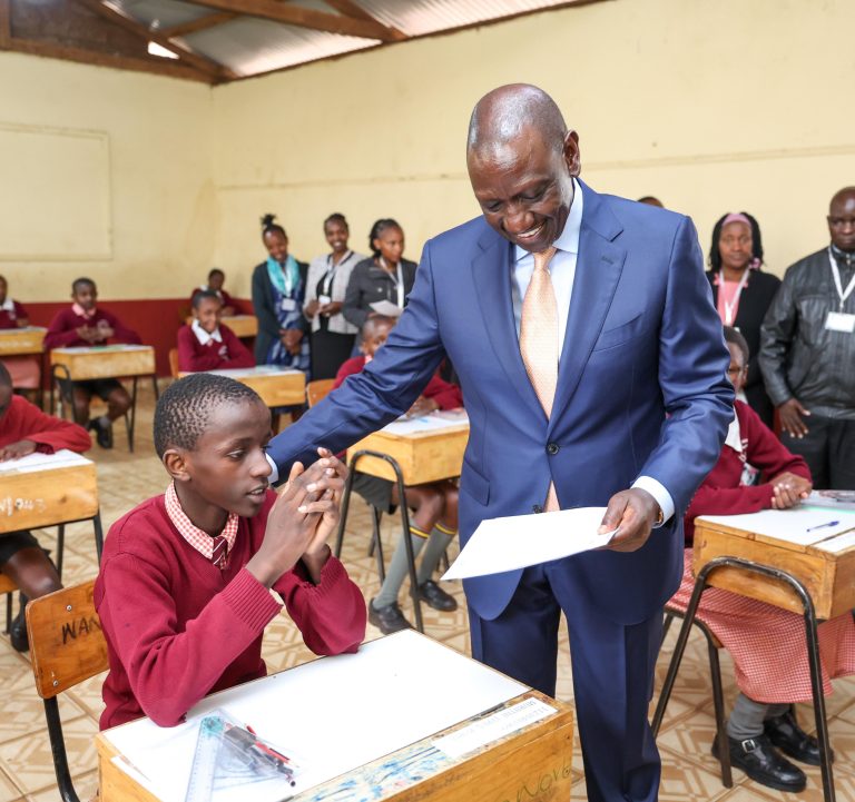 President William Ruto in a class as students start KCPE exams