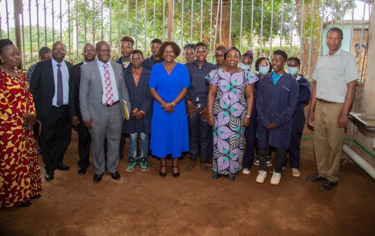 Pastor Dorcas Rigathi and Governor Cecily Mbarire take a picture with students of Tenri Vocational Training Centre in Embu Town