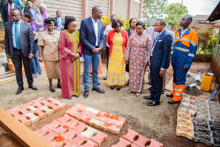 Pastor Dorcas Rigathi with other leaders being shown some of products