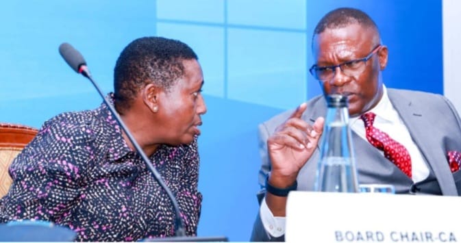 Cabinet Secretary Eliud Owalo with Communication Authority chairperson Mary Wambui confers during yesterday's forum