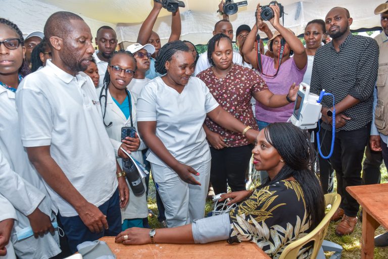 Kirinyaga County Deputy Governor David Githanda being taken through some of tests that were carried out during the medical camp