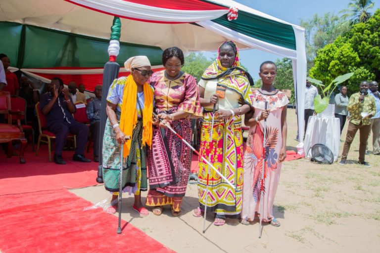 The spouse of the Deputy President Pastor Dorcas Rigathi donates white canes to blind widows the Gede Primary School Grounds in Kilifi North Sub-County