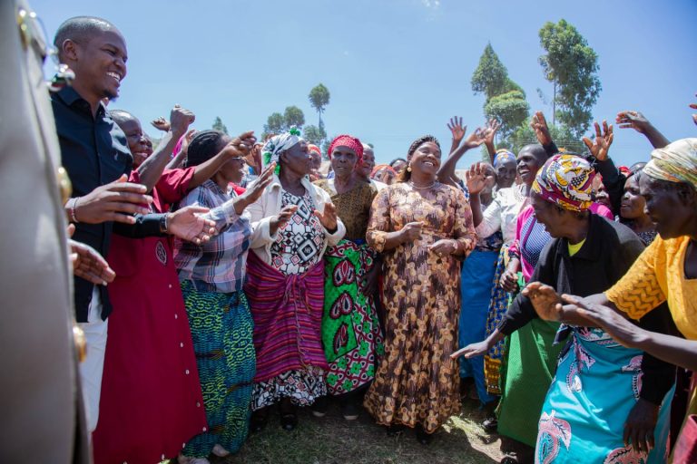 The spouse of the Deputy President Pastor Dorcas Rigathi dances with widows of TransNzoia during a widows