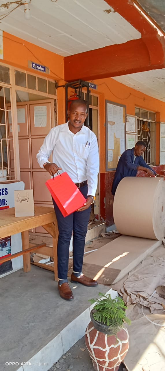Kimani wa Makaratasi going about his business