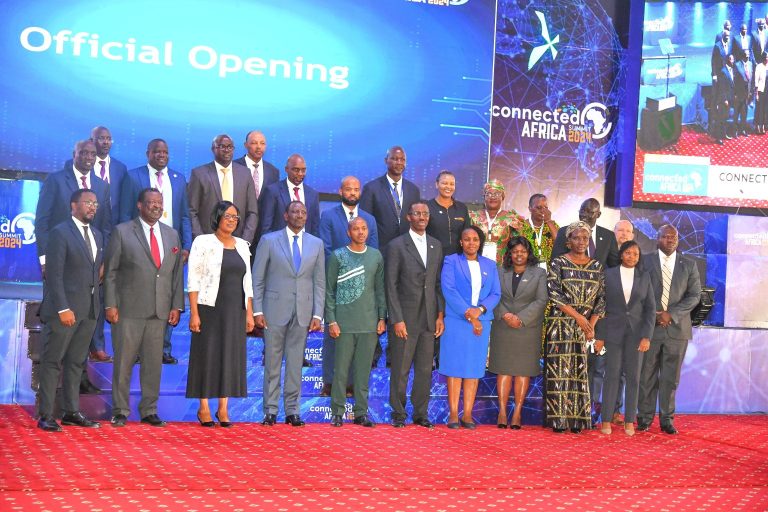 President William Ruto poses for a photo with delegates attending the Connected Africa Summit 2024 happening this week at Uhuru Gardens