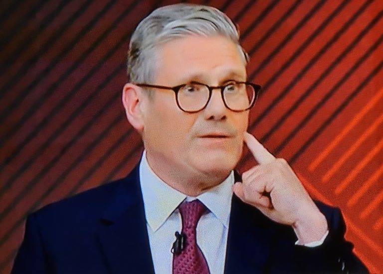 Photo 1 Labour leader Sir Keir Starmer has a lot of hard work tand planniing to do but he faces an uphioll yasl from, some of the British electorate on his manifesto promises.