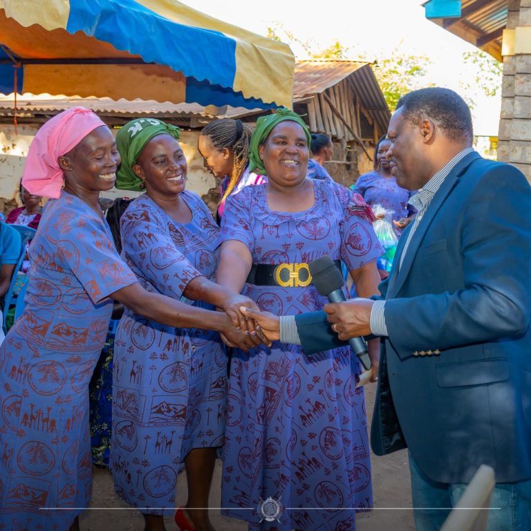 Tharaka Nithi County governor Muthomi Njuki interacts with members of the Gituri Women's Circuit group