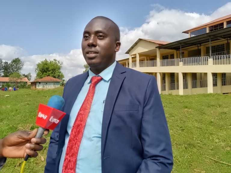 Gichugu Technical and Vocational College principal Joseph Kimemia addressing the media.