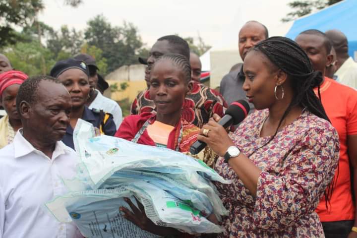 Health Principal Secretary Mary Muriuki presenting mosquito nets to some of the beneficiaries