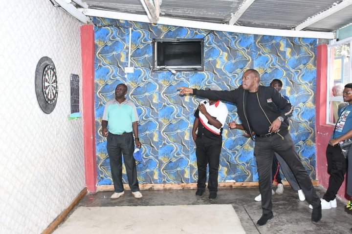 Nakuru County Chief Officer for Youth, Sports and Takent Alex Maina showing his prowess in playing Darts.