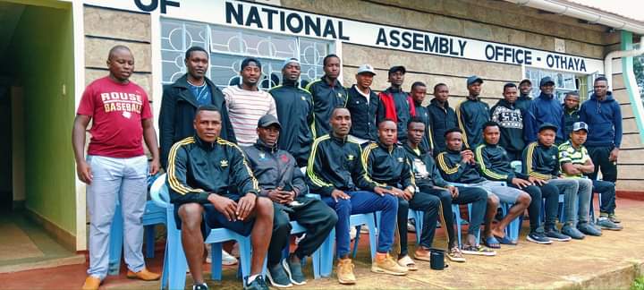 Othaya All Stars players and officials led by Waithaka Kinyua (left) at the constituency offices in Othaya town before embarking on the journey.