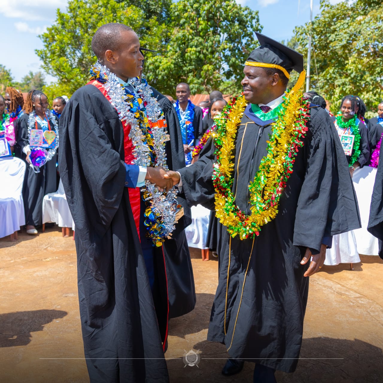 Tharaka Nithi Governor Muthomi Njuki (right) during graduation ceremony at PCEA Rubate College.