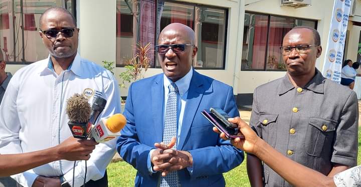 Unclaimed Financial Assets Authority senior officials addressing the media