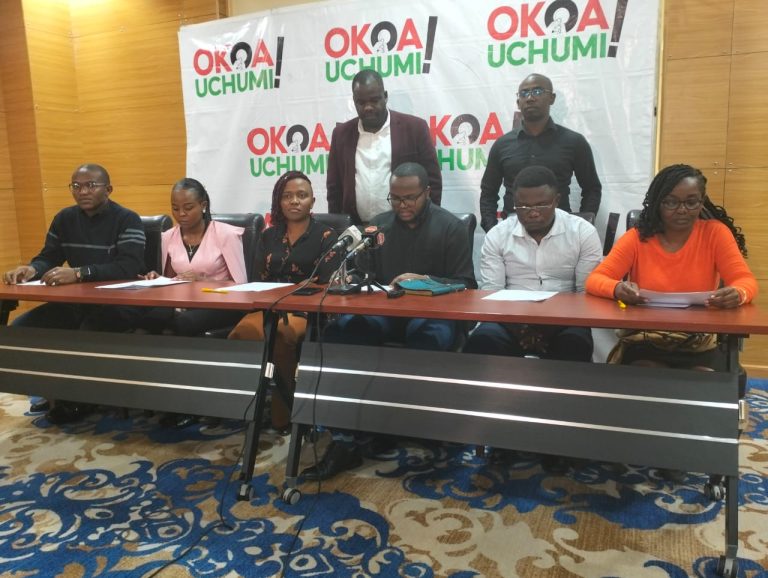 The Okoa Uchumi Campaign representatives reading a joint statement during a press briefing in Nairobi