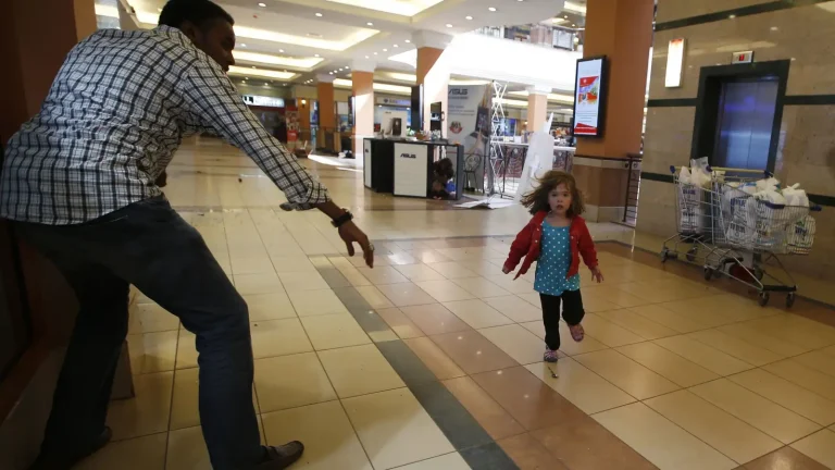 A child runs to safety during the attack on Westgate in 2013
