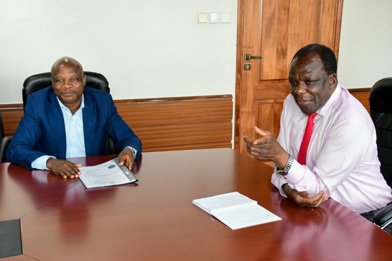National Service and Walinzi Credit Sacco Chairman Dr. Isaac GM Andabwa and CS for Cooperatives and MSMEs Hon. Wycliffe Ambetsa Oparanya