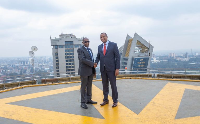Kenyatta International Convention Centre (KICC) chairman Irungu Nyakera (right) with Chief Executive Officer atop the centre's rooftop.