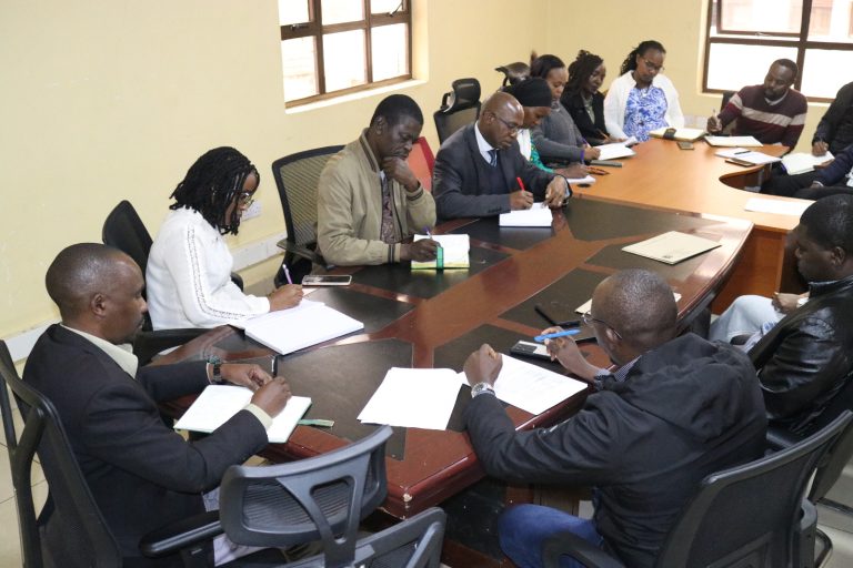 Mr Julius Mwololo County KISIP coordinator chairing the meeting