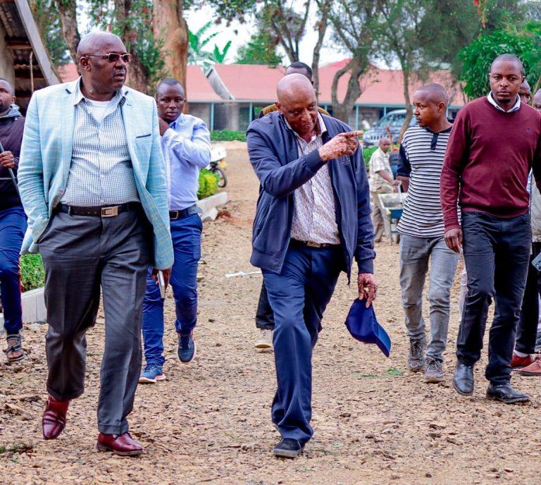 Othaya Member of Parliament Wambugu Wainaina (left)