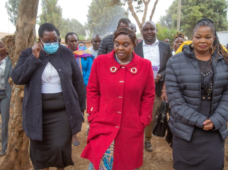 Pastor Dorcas Rigathi (in red), Senator Peris Tobiko (in mask), and Doris Parit (sister in law to the deceased) in Oloitoktok, Kajiado County during the burial of Loise Purdul, daughter to former Kajiado South MP and Assistant Minister Phillip Ole Sing'aru who until her demise was head teacher Athi River GK Prison Primary School.