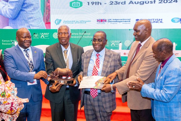 Prof. David Musyimi Ndetei being honored for his exemplary research achievements.